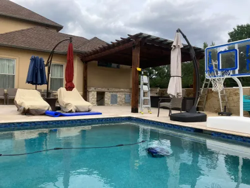 Covered pergola with polycarbonate roofing