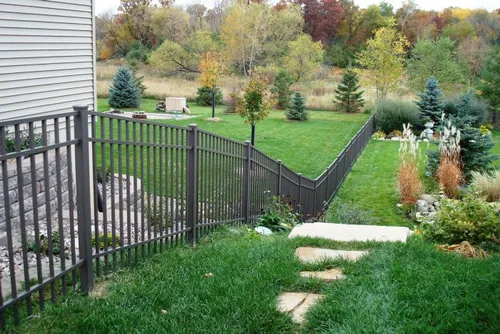 Metal and wire fence with wooden frame